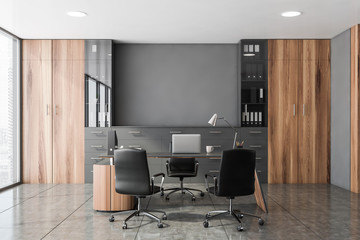 Gray and wooden CEO office interior - obrazy, fototapety, plakaty