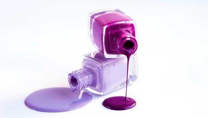 nail Polish various shades of pink poured from a bottle