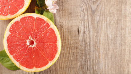 red grapefruit slices- top view copy space