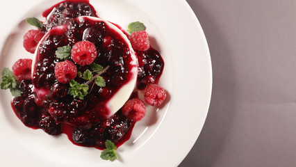 panna cotta with berry fruit syrup