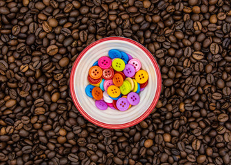 Roasted Coffee Beans with A Bowl of Buttons