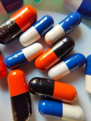 Photo of capsules on white background. Medicine capsules photo. Drugs for human. 