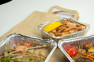 Natural fitness dishes prawns for proper nutrition on self-isolation. The concept of proper nutrition, delivery.