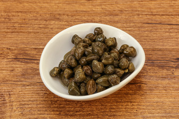 Tasty capers in the bowl