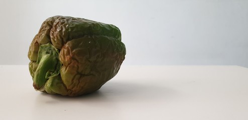 Fototapeta premium close up of green capsicum gone bad