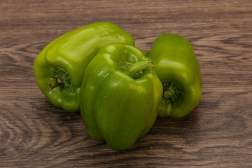 Three green bell juicy peppers