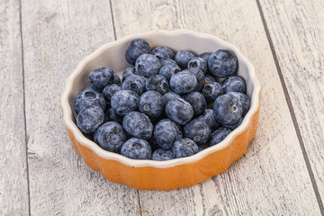 Obraz na płótnie Canvas Sweet fresh juicy blueberries heap