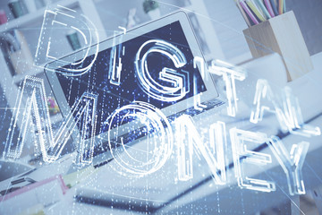 Multi exposure of blockchain and crypto economy theme hologram and table with computer background. Concept of bitcoin cryptocurrency.