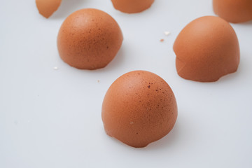 Broken egg shell on white background