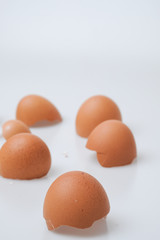 Broken egg shell on white background