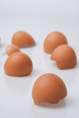 Broken egg shell on white background