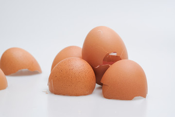 Broken egg shell on white background