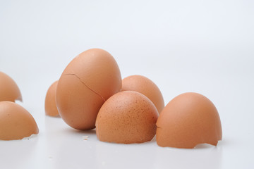 Broken egg shell on white background