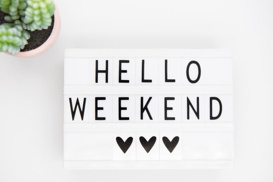 white lightbox with the words hello weekend.  Inspirational Quote
