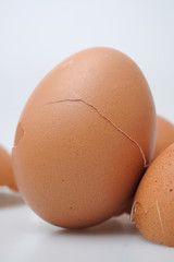 Broken egg shell on white background