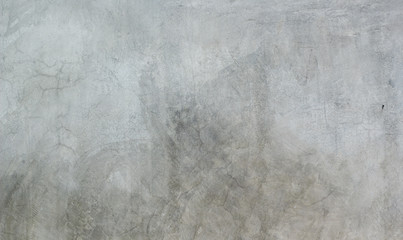 Plastered concrete wall or cement floor, rough building material of gray color. 