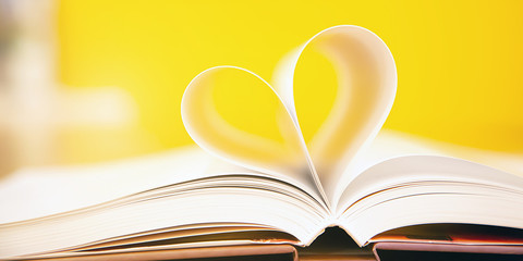 The pages in the book are heart-shaped in the library. Ideas for reading, studying, love and concentration.