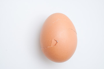 Broken egg shell on white background