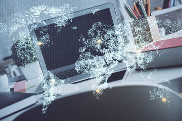 Computer on desktop with social network hologram. Multi exposure. Concept of international people connections.