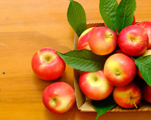 New Zealand apple on wooden background