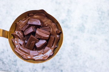 Melted dark chocolate. Copy space.