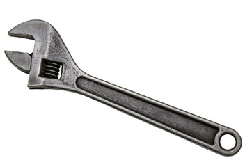 Large adjustable wrench on a white background. Insulated object. Old worn tool for mechanic. Metal texture close-up.