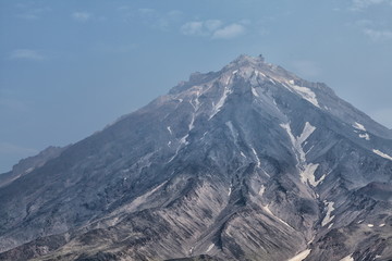 mountain landscape with snow and clouds