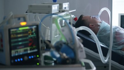 Infection, covid-19 pandemic, 2019-ncov concept. Respiratory medical system with patients connected to it - Powered by Adobe