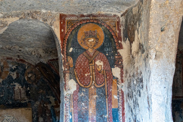 The frescoes of the rock church of Santa Margherita and cave dwellings in Mottola, Taranto, Apulia (Puglia), Italy