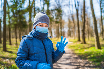 Portrait of a boy wearing a protective mask against coronavirus. Pandemic Covid-19.