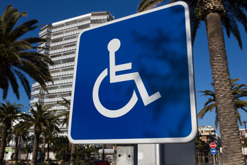 Sign for disabled parking close-up. A clear sunny day.