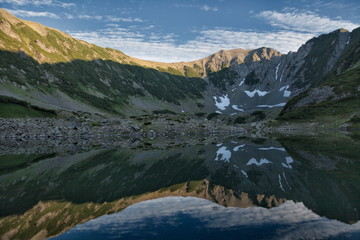 Fototapeta na wymiar mountain landscape with lake and mountains