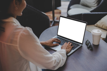 computer mockup image blank screen with white background for advertising text,hand woman using...