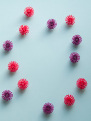 Coronavirus models on neutral background with copy space
