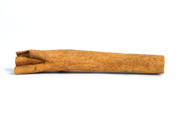 Closeup dried cinnamon stick isolated on a white background