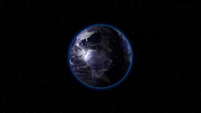The earth in lights rotates in space