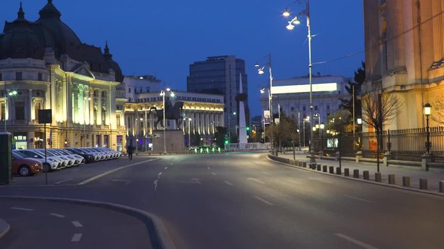 Moving shot of empty city centre streets due to covid-19 pandemic quarantine in Eastern Europe, Bucharest at dusk