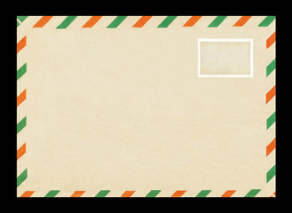 Vintage postage envelope on a black background, message, air mail