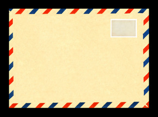 Vintage postage envelope on a black background, message, air mail