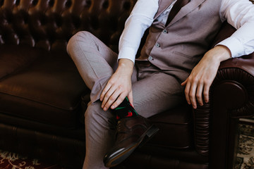 Fototapeta premium a man sits in a chair