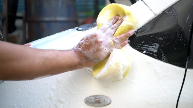 He was washing the car when holiday. 