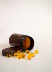 pills and vitamins on a white background
