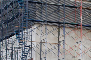 Obraz premium Scaffolding for construction with ladder up and down