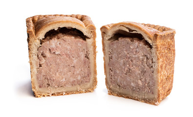Traditional English savoury pork pie isolated on white