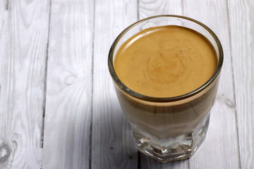 'Dalgona coffee' is a beverage from South Korea, made by whipping equal proportions of instant coffee, sugar and hot water until it becomes creamy and then adding it to cold or hot milk