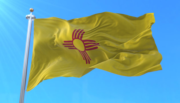 Flag of american state of New Mexico, region of the United States, waving at wind