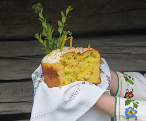 Woman holds Easter cake during Easter celebration in Kiev, April 28, 2019.