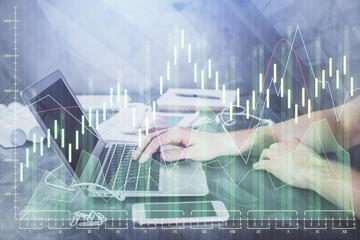 Double exposure of forex chart with man working on computer on background. Concept of market analysis.