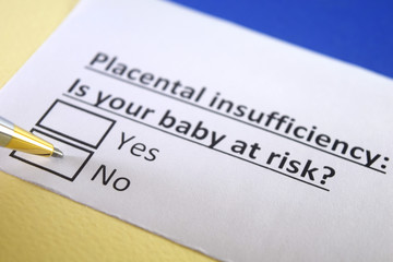 Obraz premium One person is answering question about placental insufficiency.