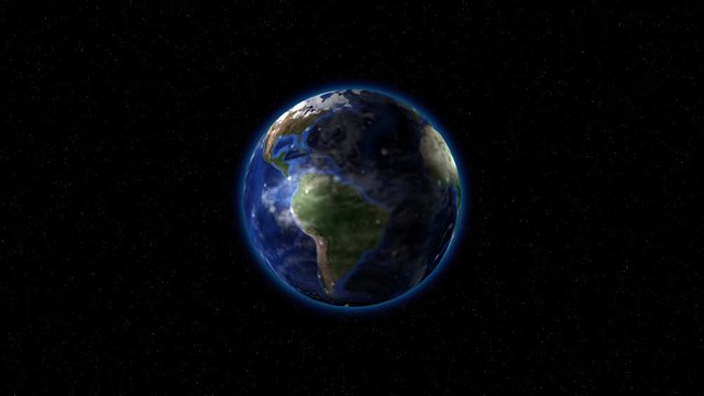 The earth rotates with luminous dots